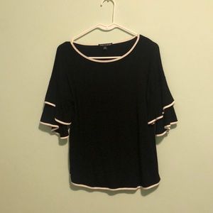 Black and white ruffled top